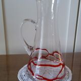 Glass decanter with red glass nets