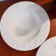 Set of 6 white ceramic deep plates made in Italy.
