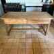 Renovated raw wood farmhouse table