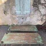 Pair of green teak coffee tables.