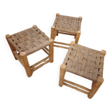 Set of three brutalist wooden stools, rope seat