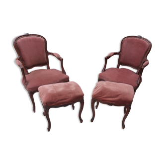 Pair of armchairs with Louis Philippe style footrests in walnut