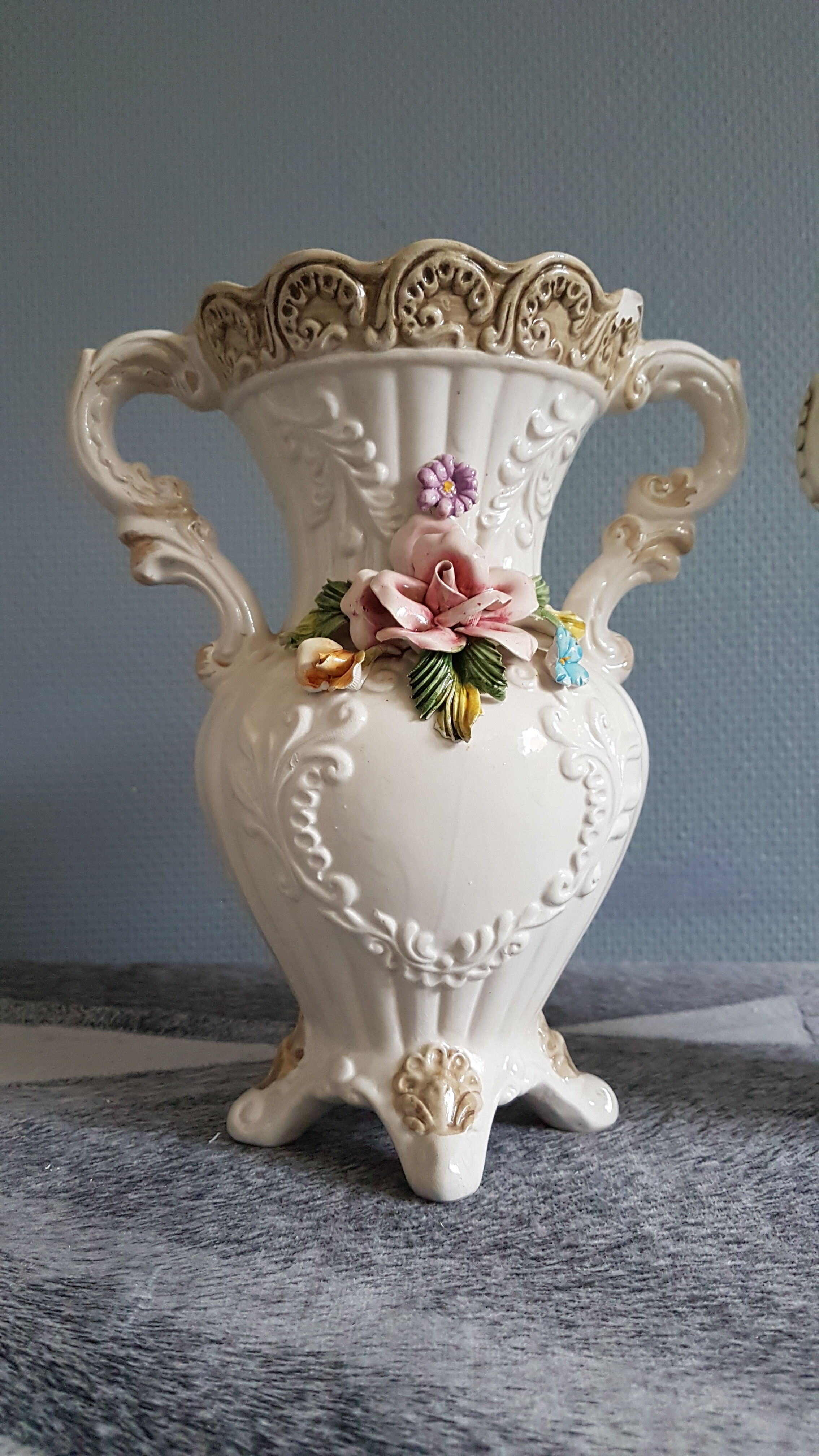 White dabbling vases with capodimonte porcelain floral decoration