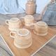 Tasses couleur beige miel