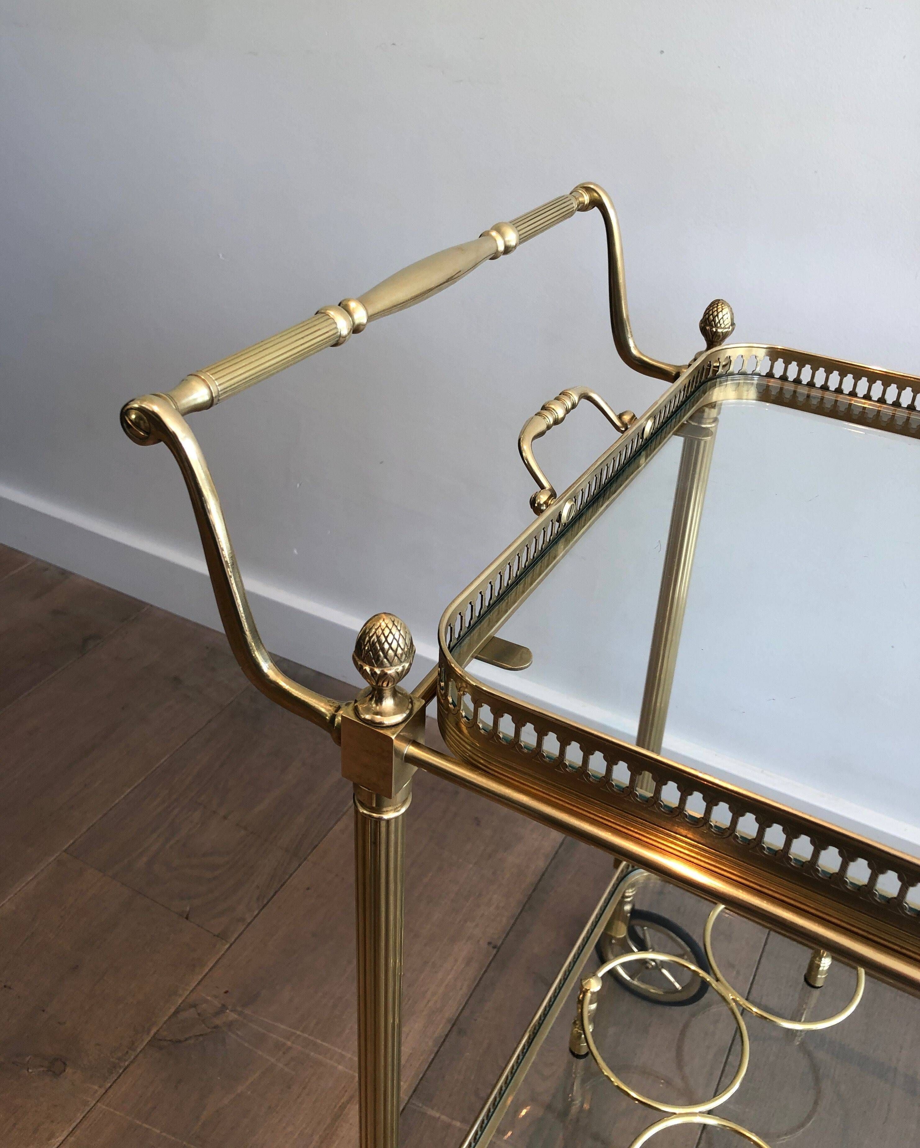 Brass rolling table with removable double trays from Maison Jansen.