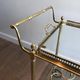 Brass rolling table with removable double trays from Maison Jansen.