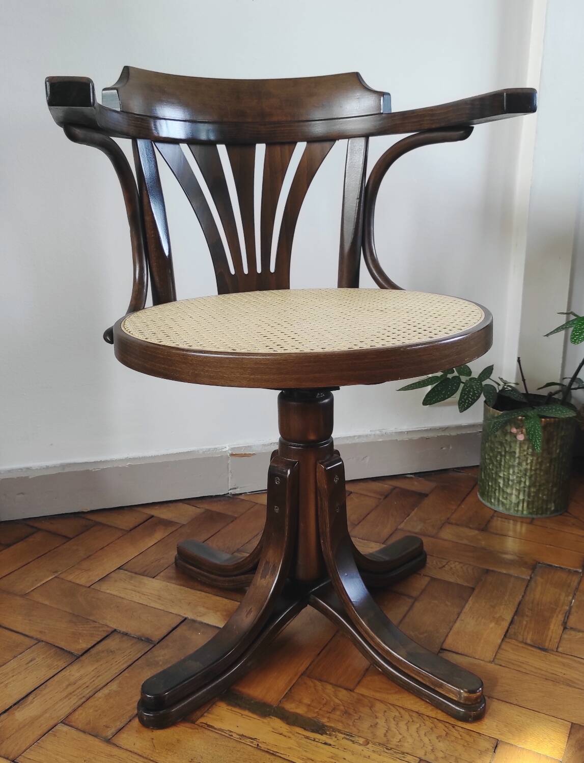 Vintage swivel office chair with curved wood and caning (Thonet style)