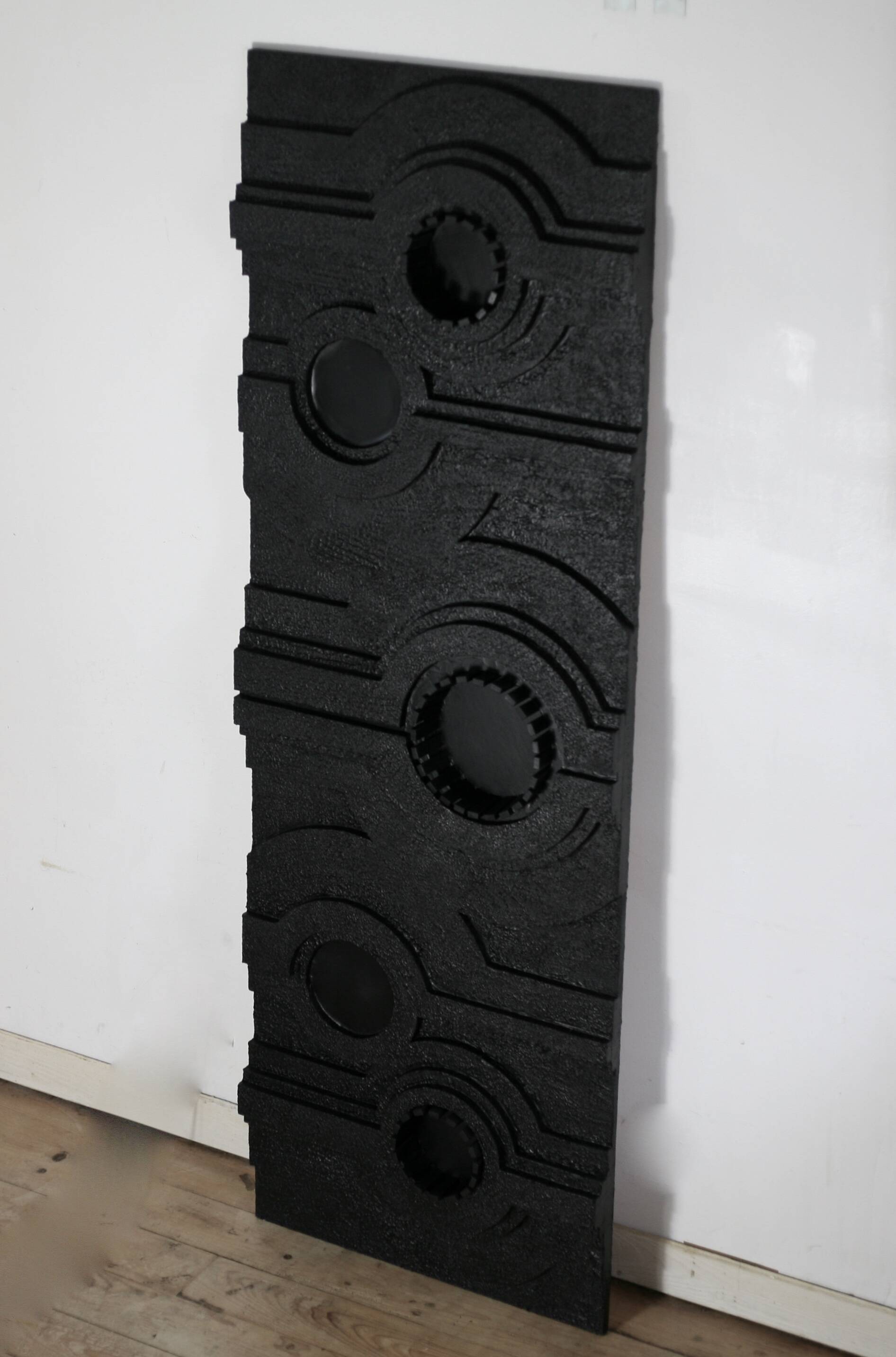 Wall sculpture, wood and black coating, late 1970s