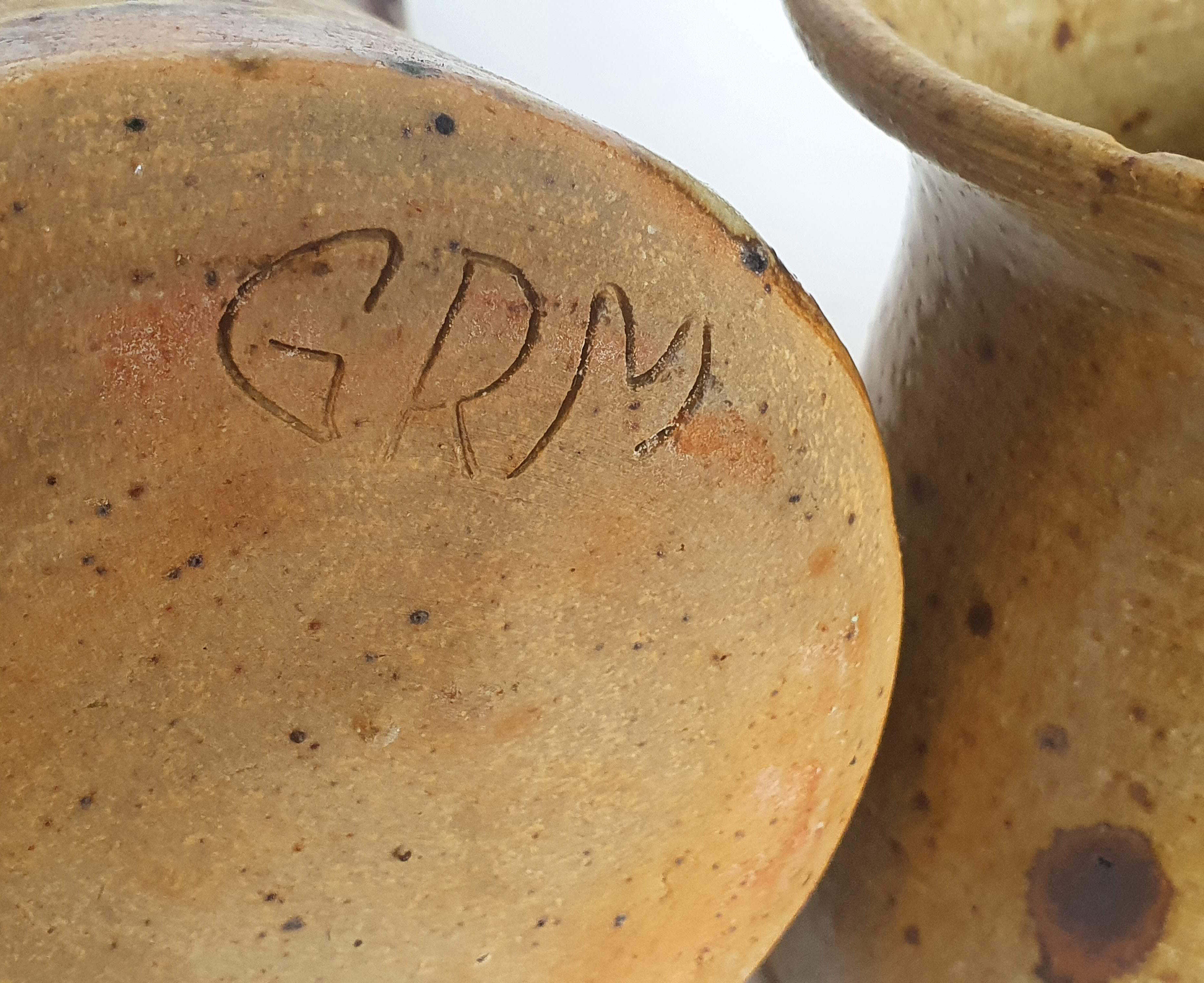 Covered pyrity sandstone pots signed GRM