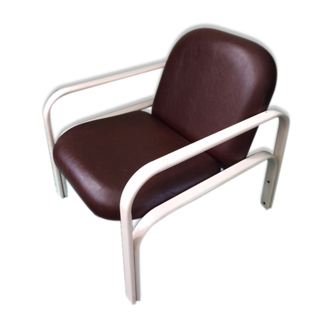 Chair design and vintage of the 1970s, structure in metal and faux leather cushions