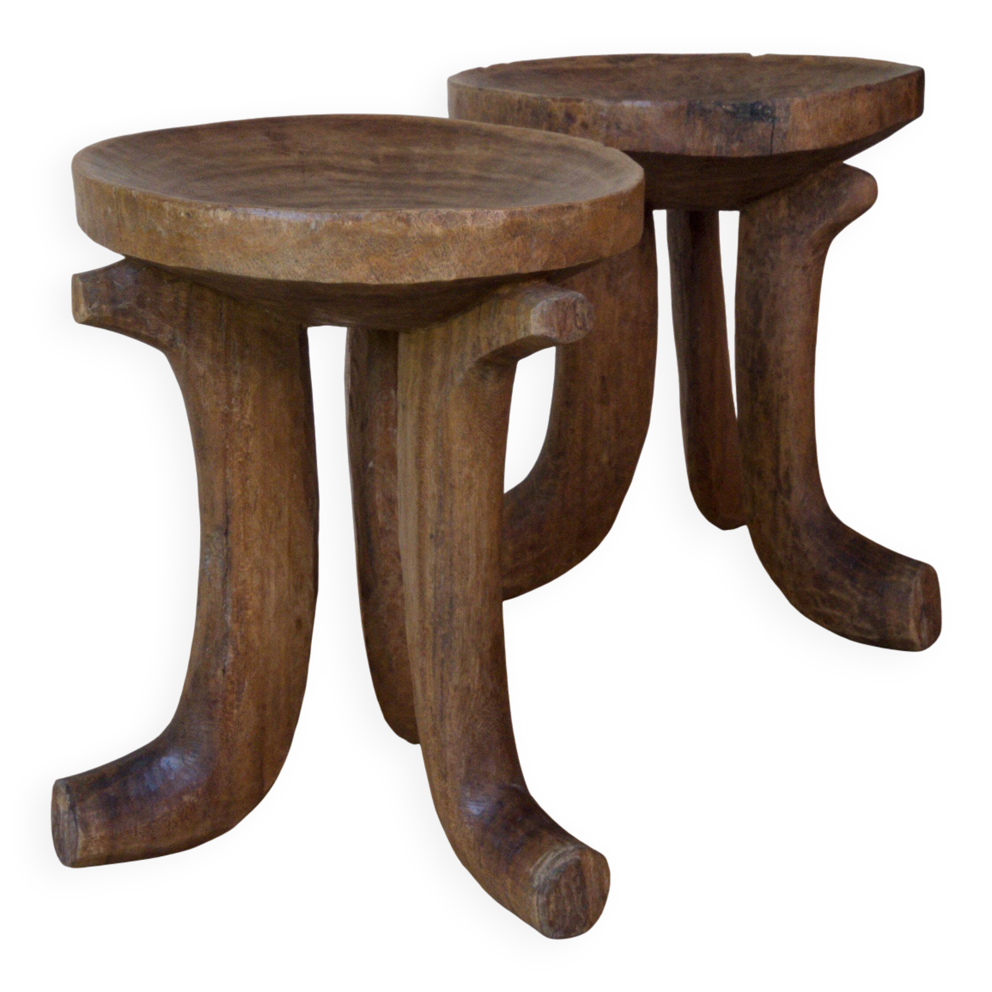Pair of ancient Ethiopian tripod stools made of monoxyle wood.