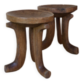 Pair of ancient Ethiopian tripod stools made of monoxyle wood.