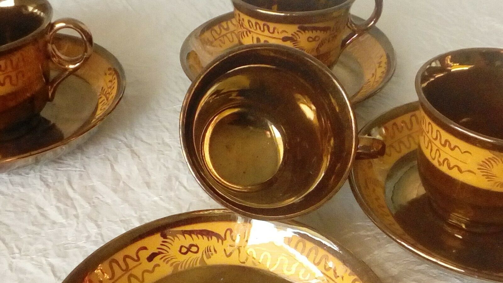 4 cups a cafe and under cups in faience of jersey