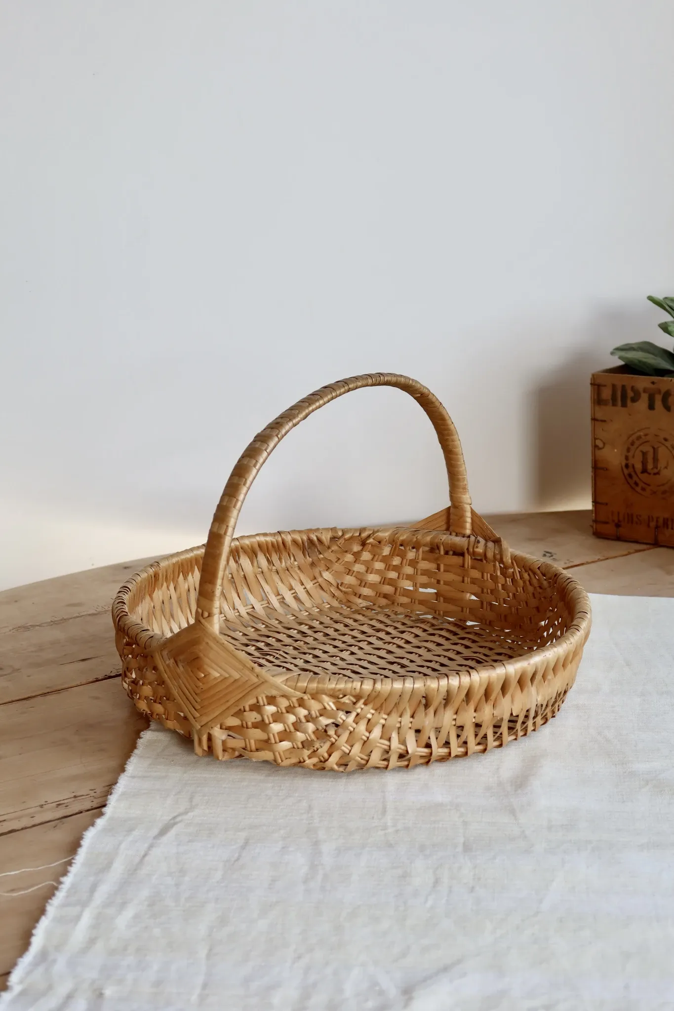 Vintage hand-woven wicker harvest basket