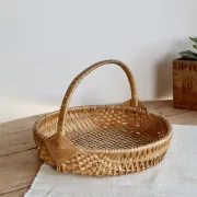 Vintage hand-woven wicker harvest basket
