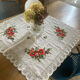 Linen tablecloth with embroidered flowers