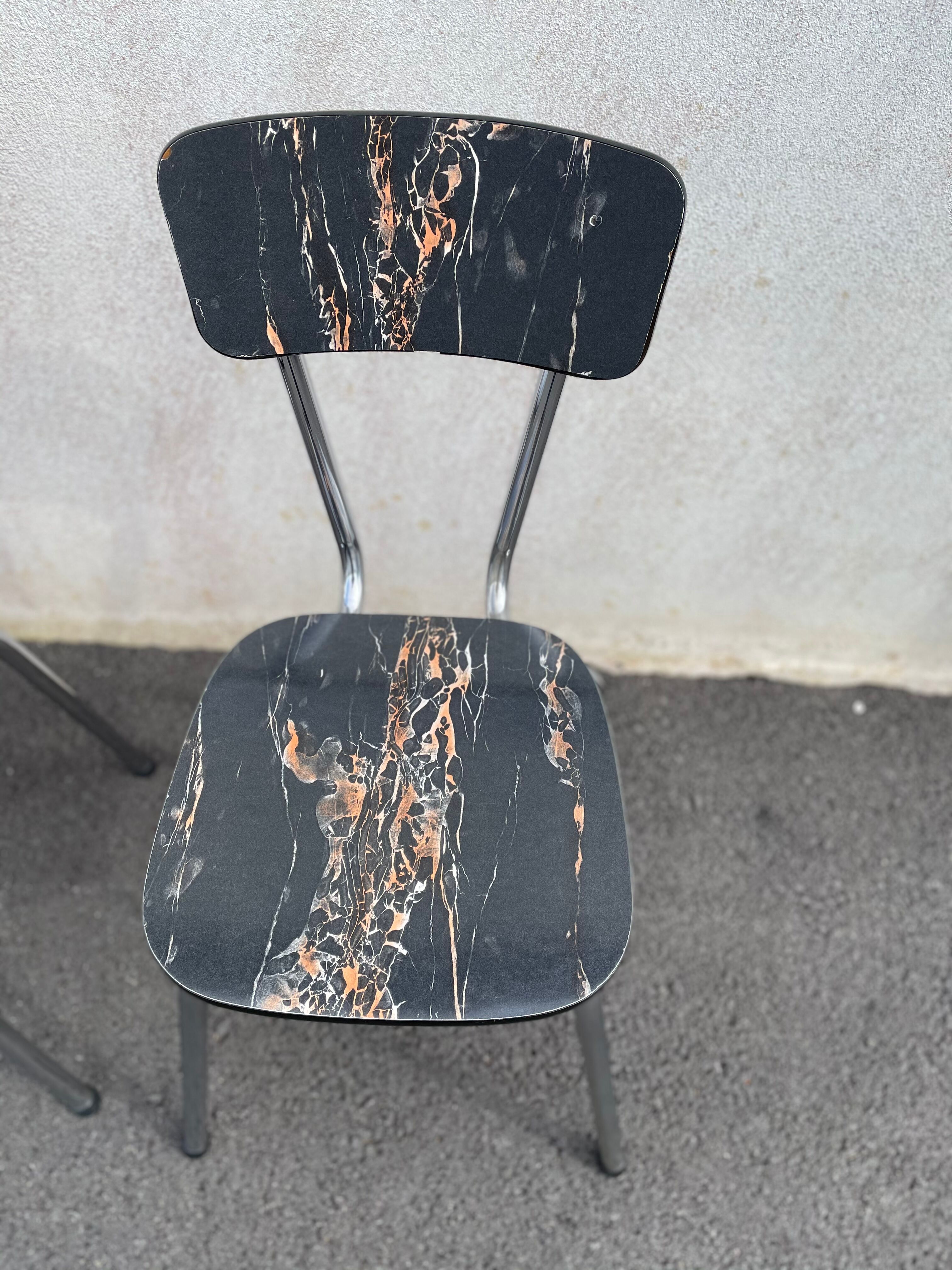 Black marbled formica chairs