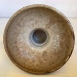 Beige ceramic chalice-shaped candle holder