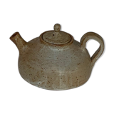 Vintage teapot in reeds