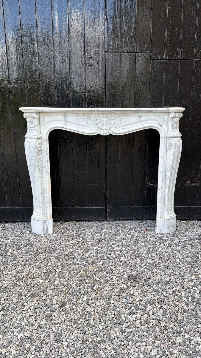 Louis XV style fireplace in Arabescato Carrara marble, circa 1880.