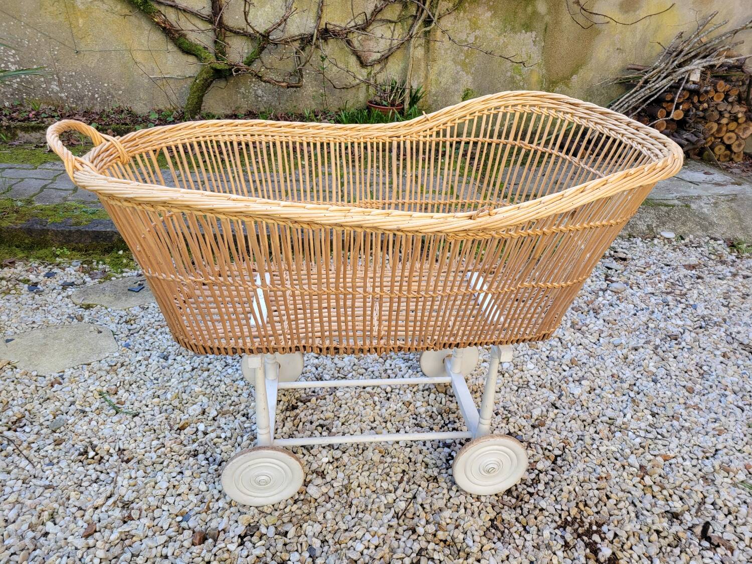 Wicker cradle on wheels, late 19th century