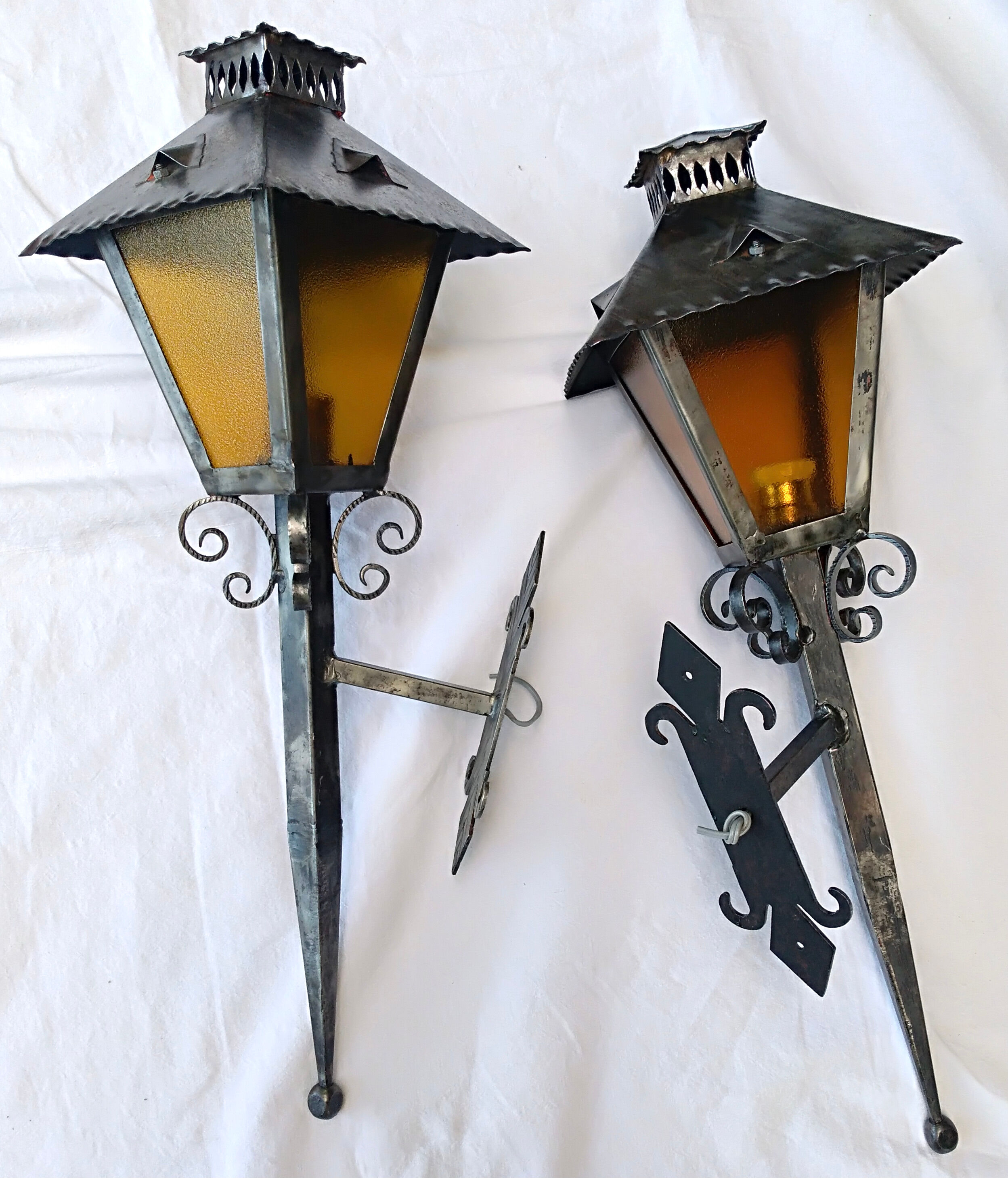 Pair of large metal sconces