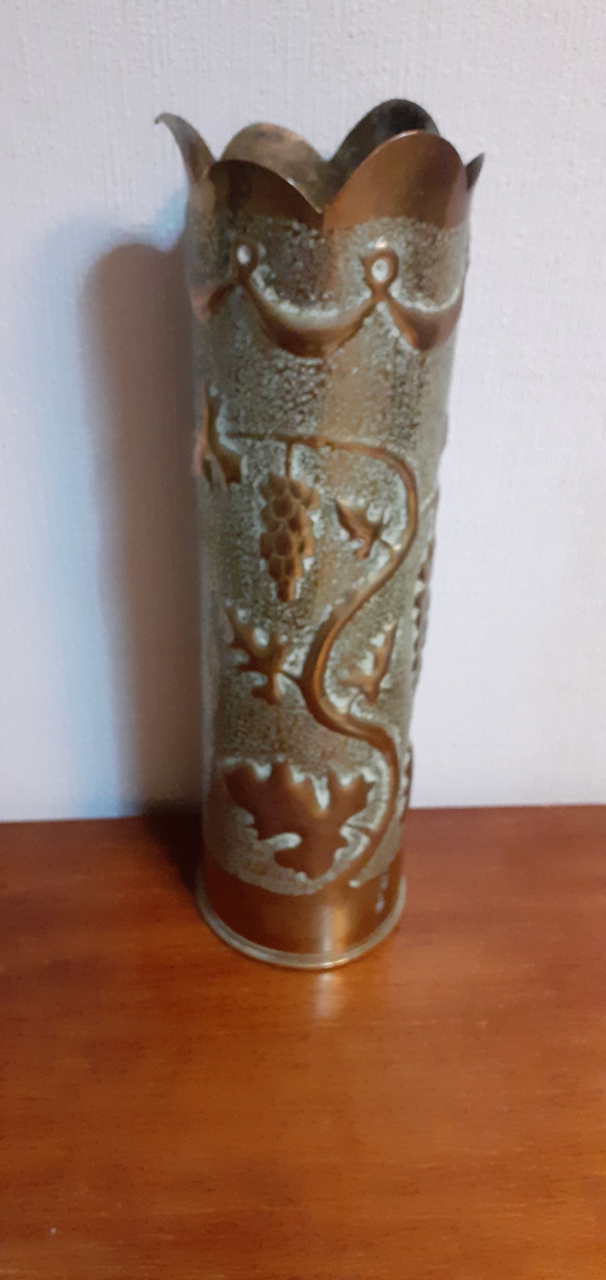 Shell casing vase carved into the trenches
