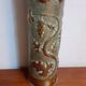 Shell casing vase carved into the trenches