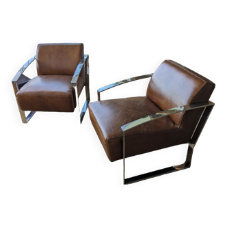 Duo de deux fauteuils en cuir