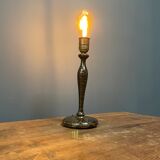 Black table lamp with paint splatters from the 1920s
