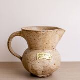 Small pitcher in old speckled stoneware
