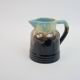 Art Deco pitcher in black, brown and blue glazed ceramic