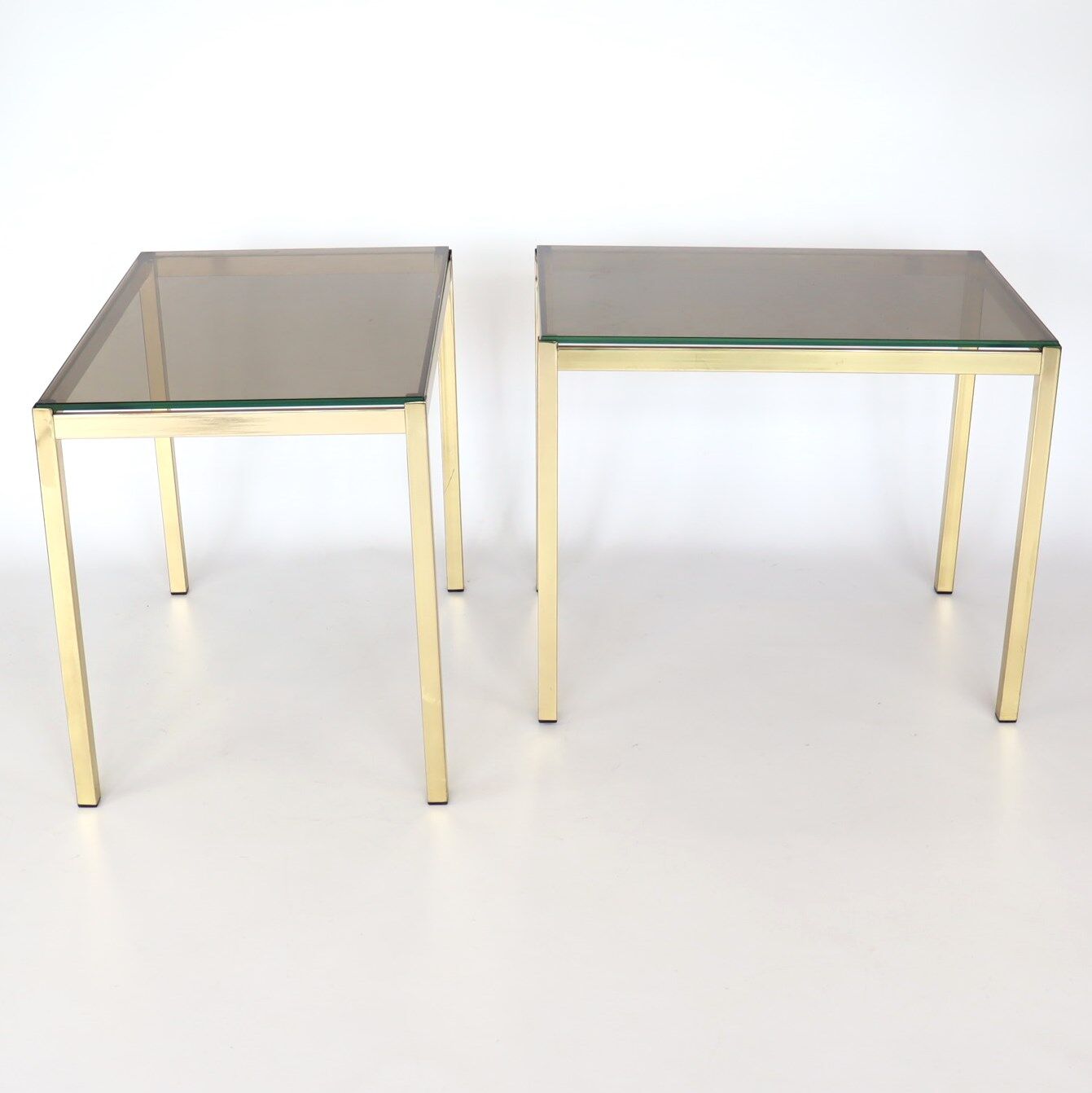 Pair of gilded metal side tables