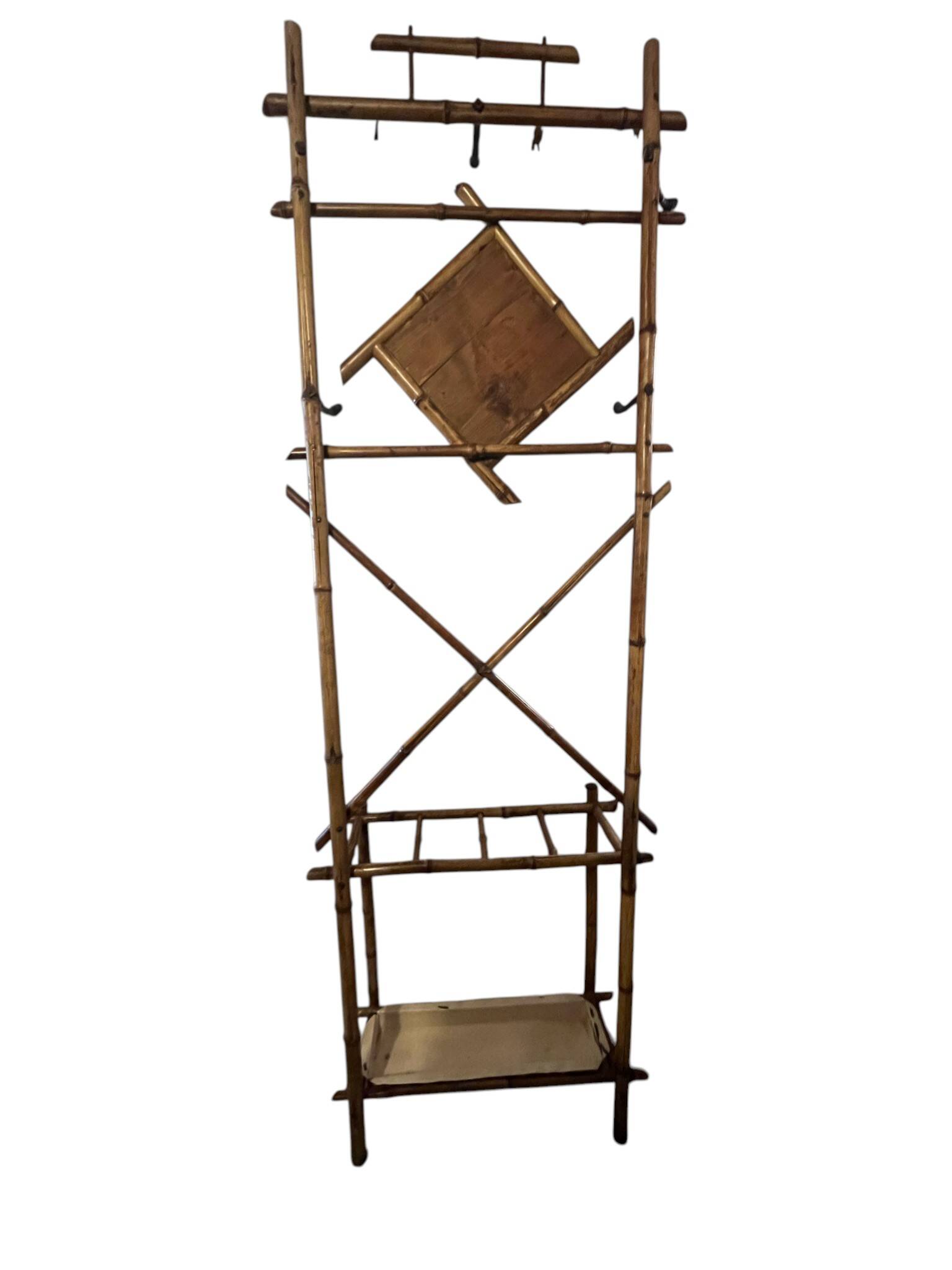 Art Deco, coat rack with bamboo mirror, diamond shape, around 1930.