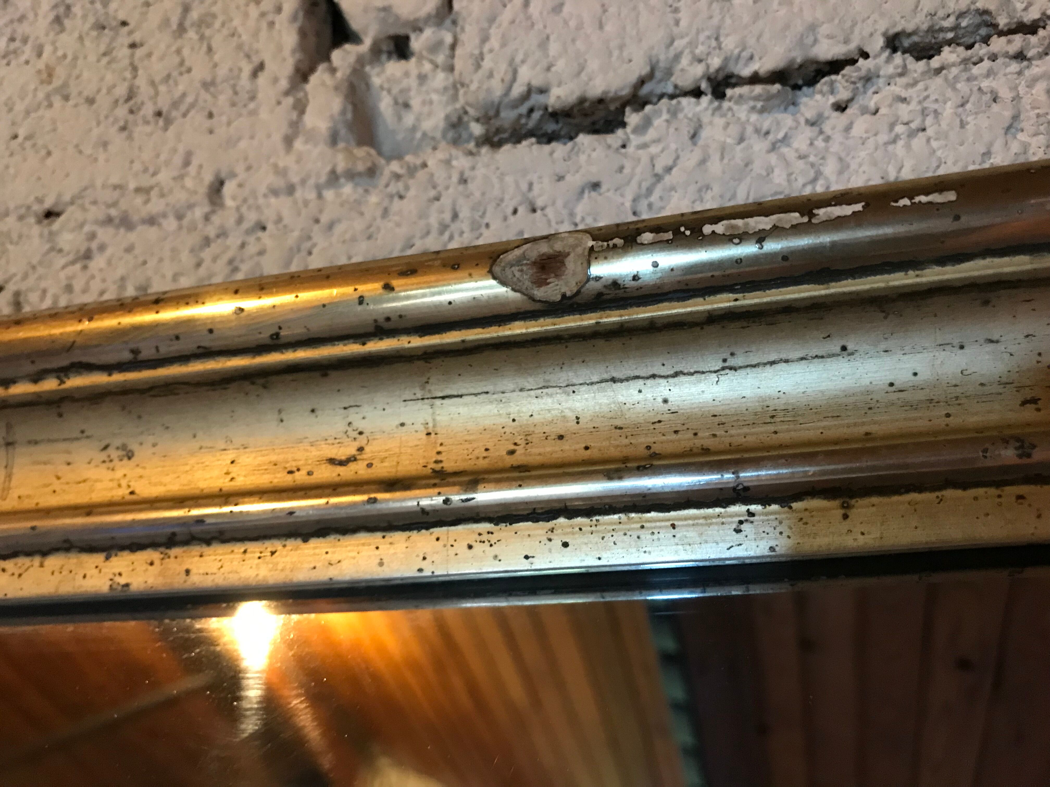 Mirror with golden mercury parquet signed david frame wood and stuck