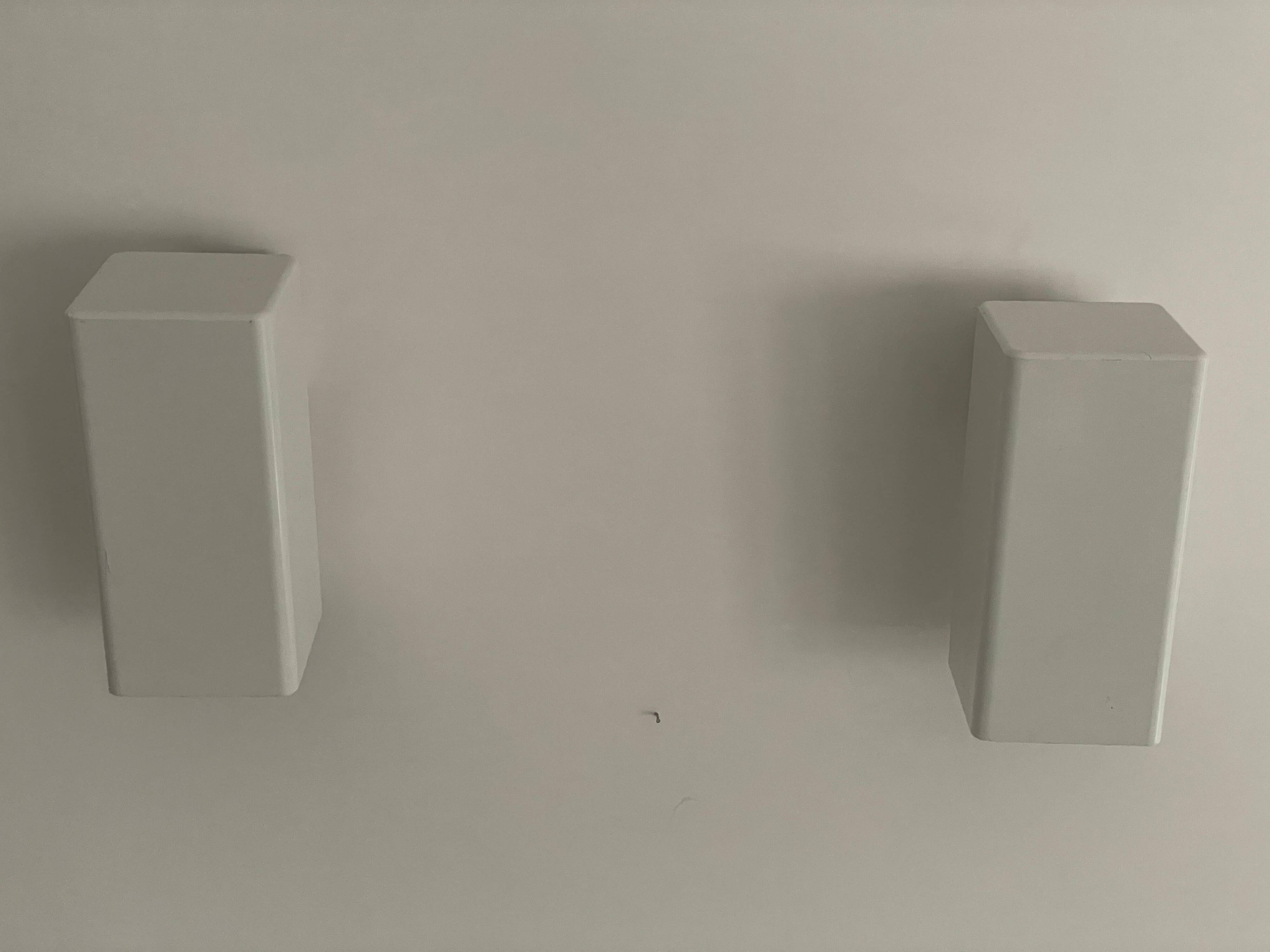 Pair of minimalist white metal wall lights from the mid-century, 1960, Germany.