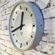 Grey industrial bakelite office wall clock from Pragotron, 1970