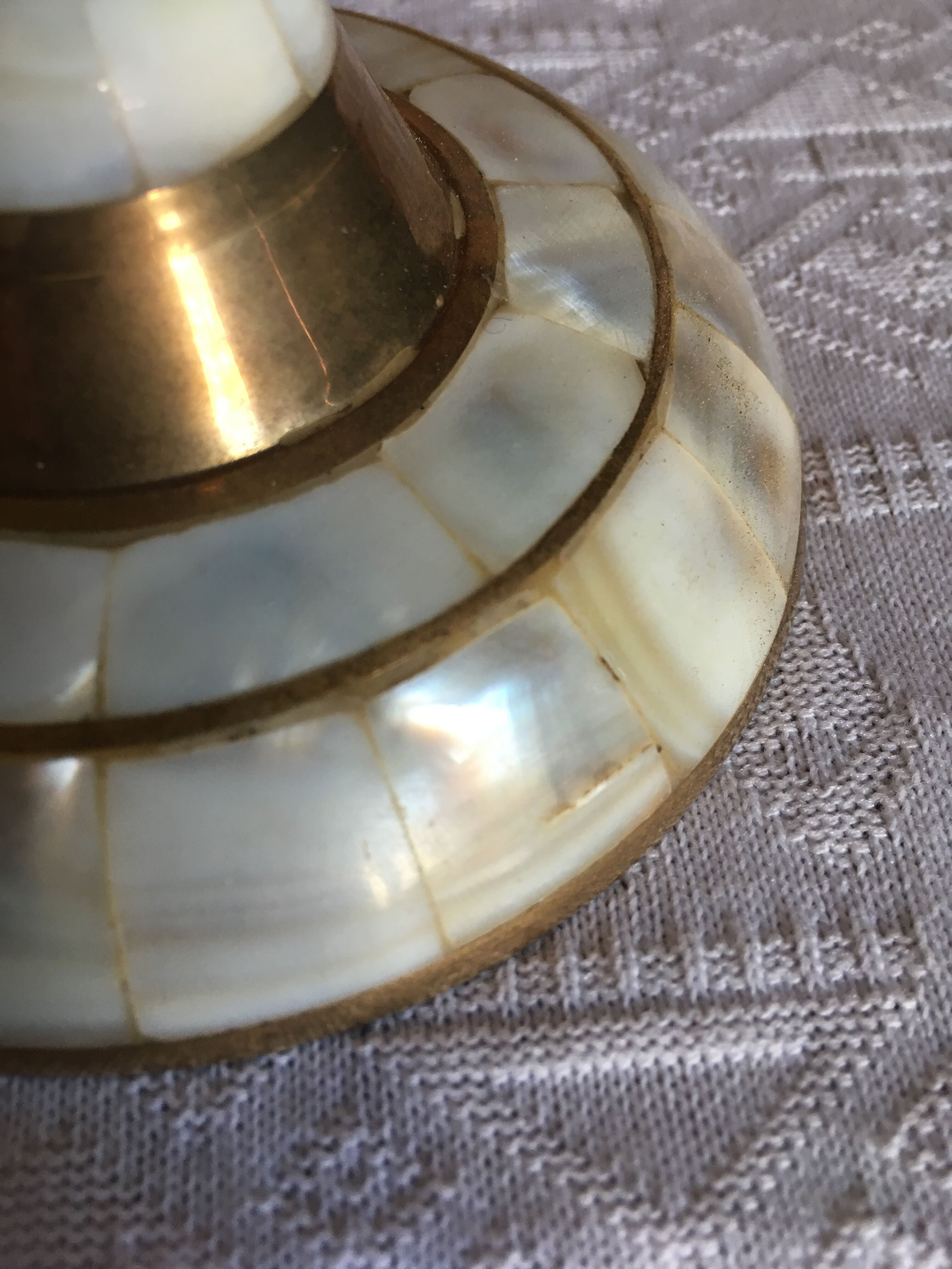 Brass and mother-of-pearl candle holder