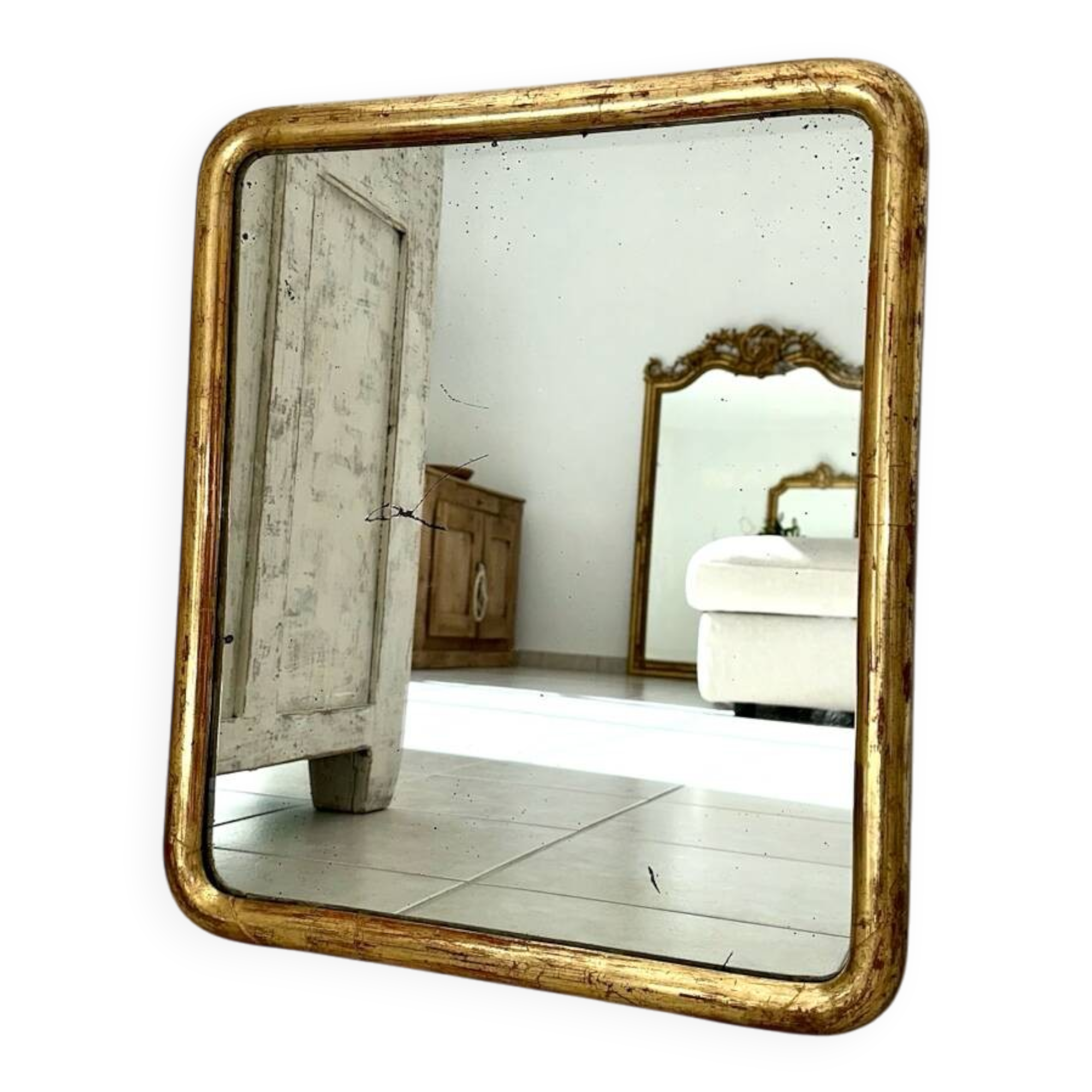 Antique gilded Louis-Philippe mirror, 19th century.