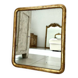 Antique gilded Louis-Philippe mirror, 19th century.
