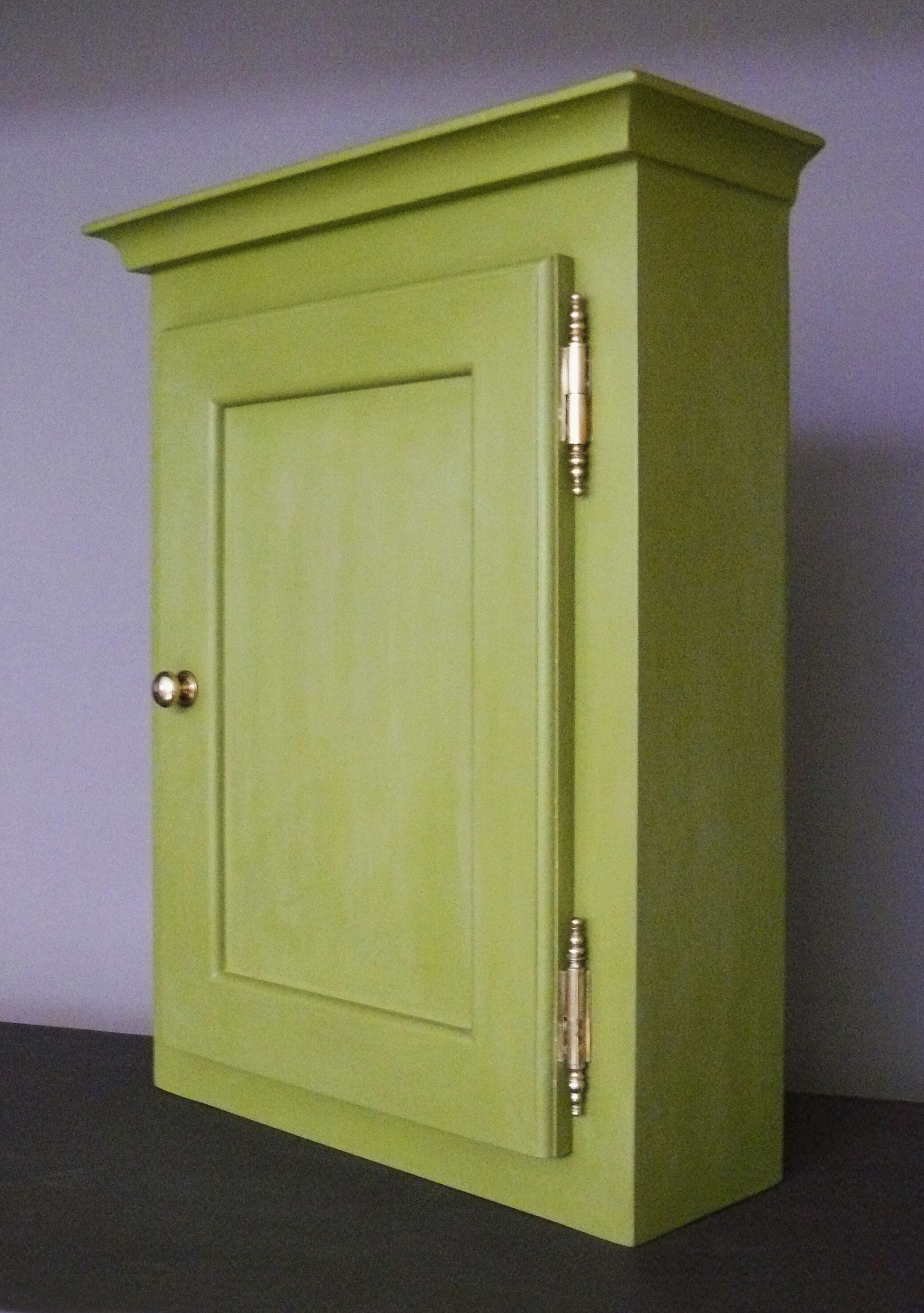 Green cabinet to hang painted and waxed