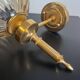 Brass wall light and bubbled glass globe
