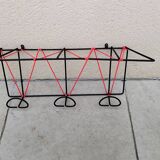 Vintage metal coat rack and wall-mounted scoubidou