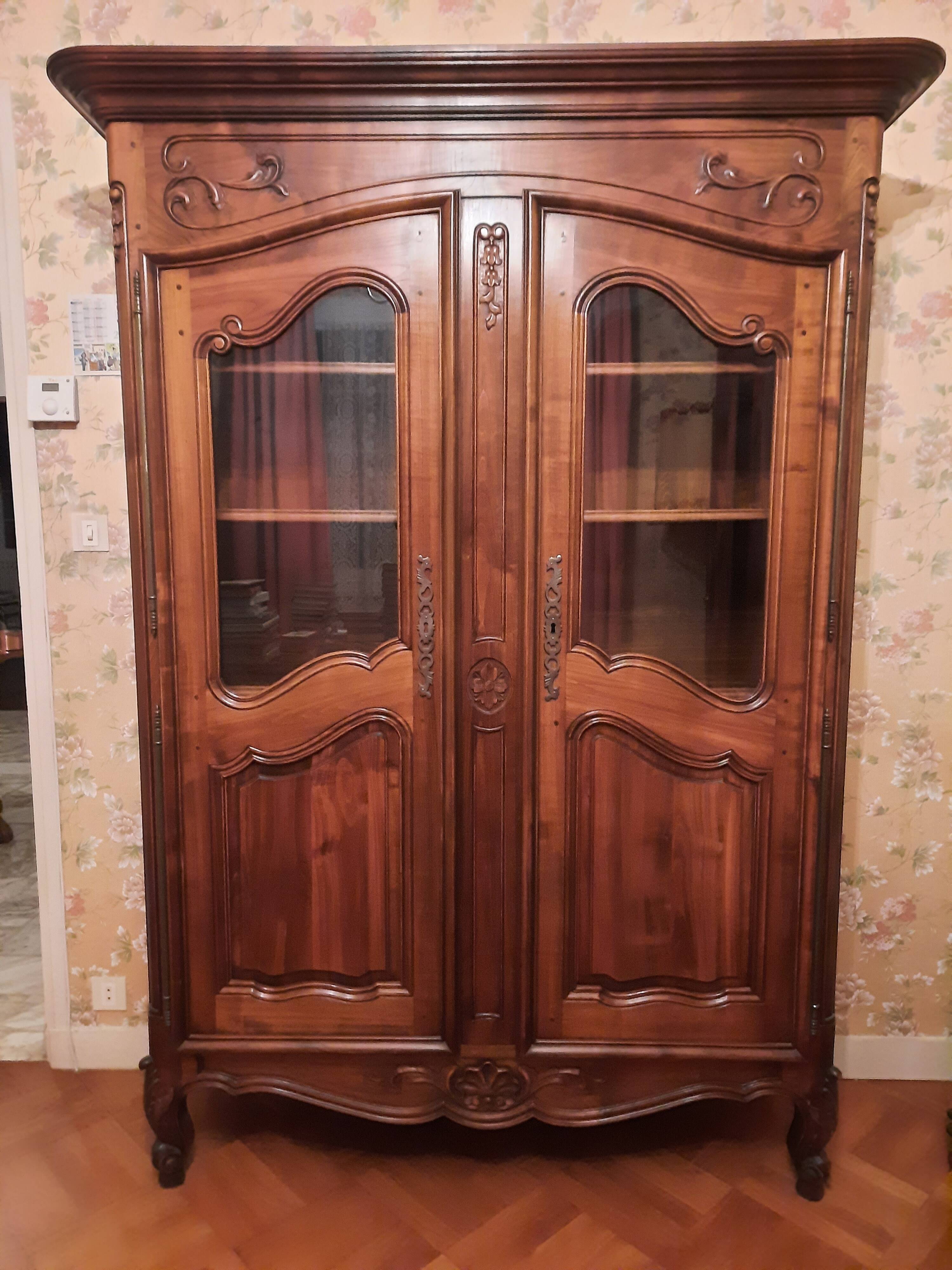 Regency bookcase in solid cherry wood stained walnut.