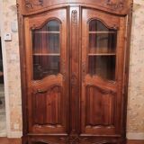 Regency bookcase in solid cherry wood stained walnut.