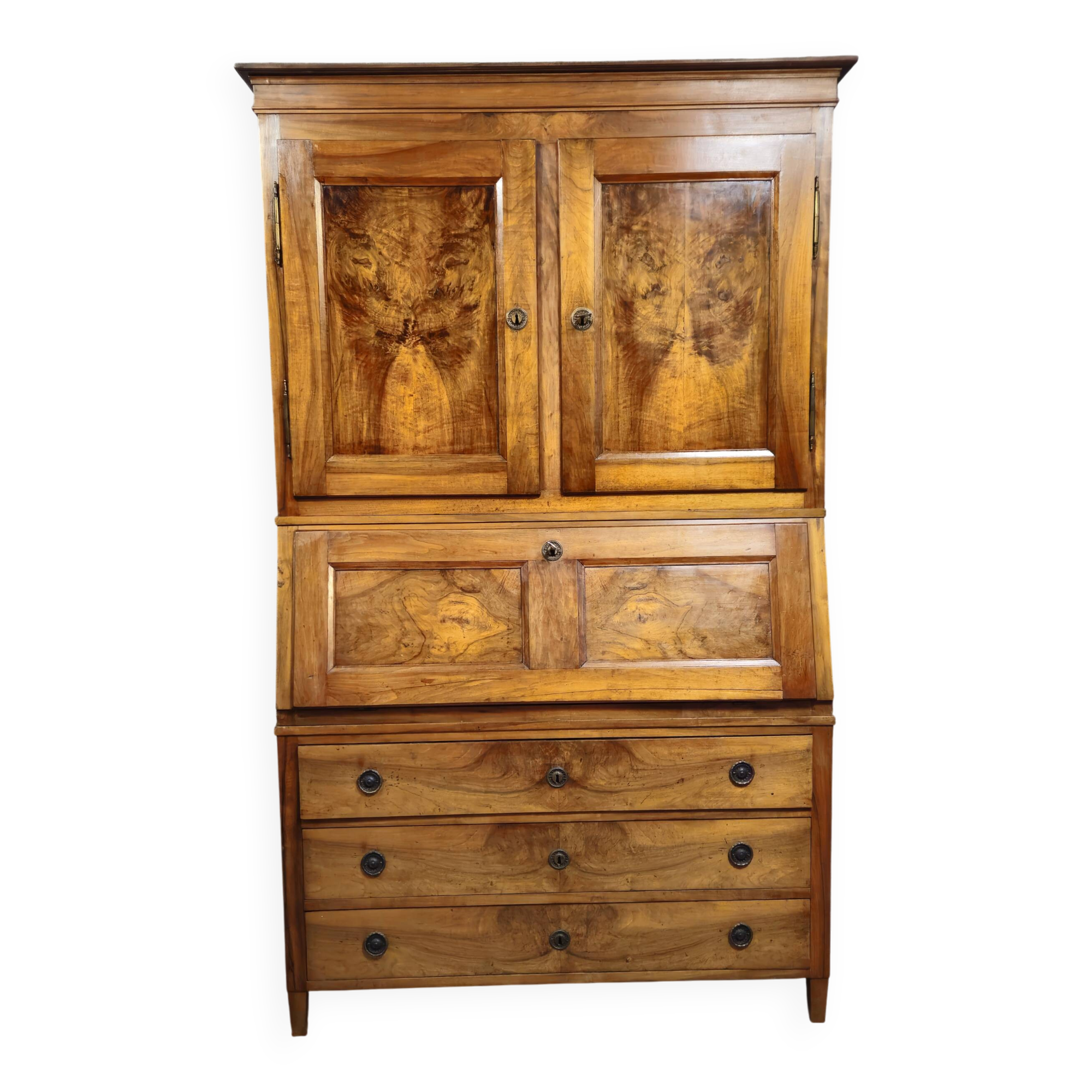 Secretary with three bodies in walnut from the Louis XVI period.