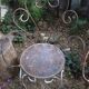 Duo of iron lawn chairs