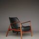 Seal armchair in leather and teak by Ib Kofod-Larsen for OPE, Sweden, 1960s.