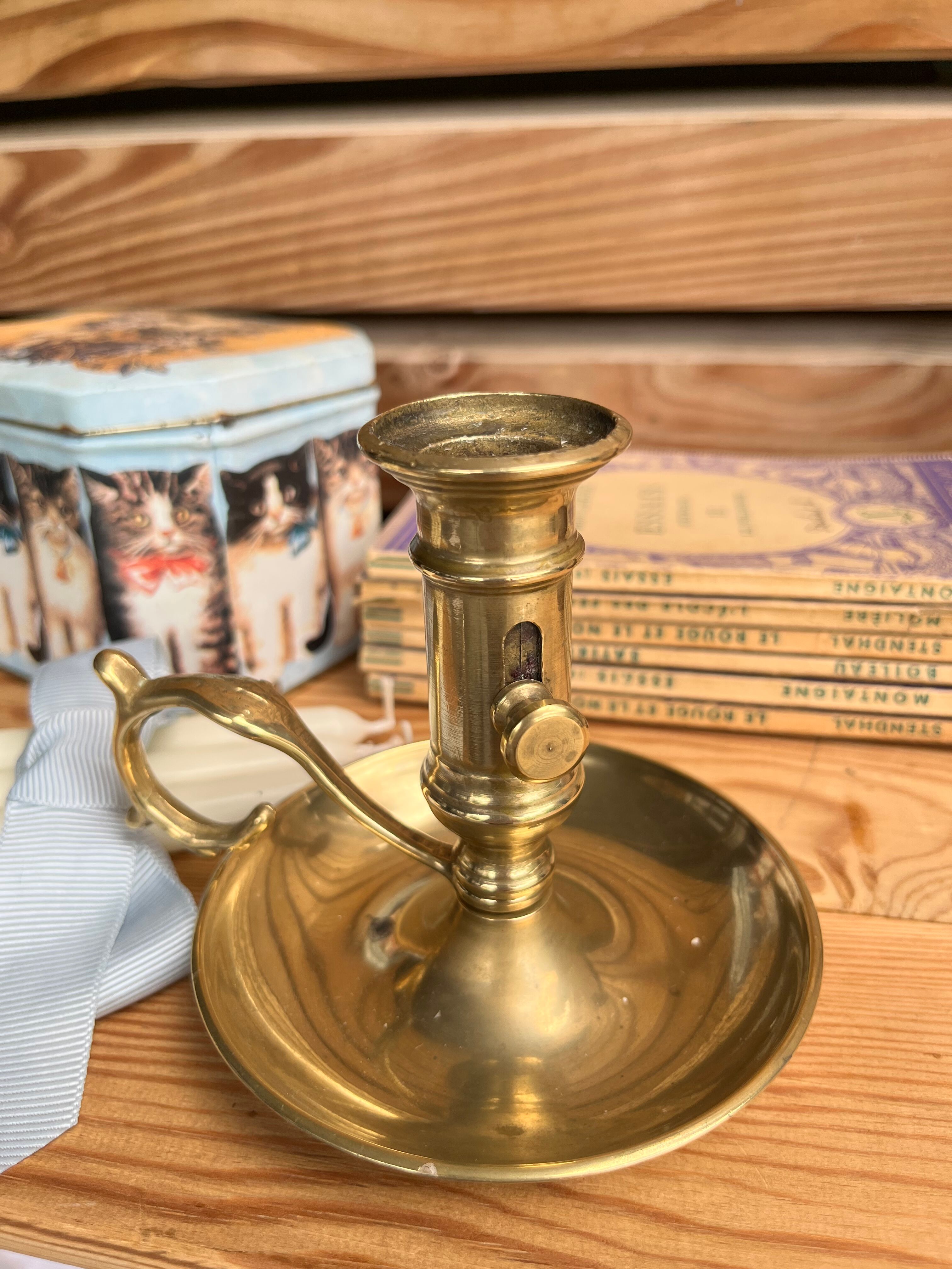 Duo of brass hand candle holders