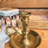 Duo of brass hand candle holders